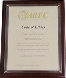 Plaque with IARFC Code of Ethics on a beige background